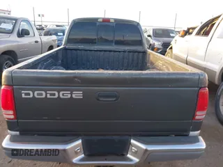 2002 Dodge Dakota SLT with VIN 1B7GL42X42S682184, listed as a IAAI auction lot 41784688 with 168,298 mi miles. Bid and sale history available at carsss.com. Image 16.