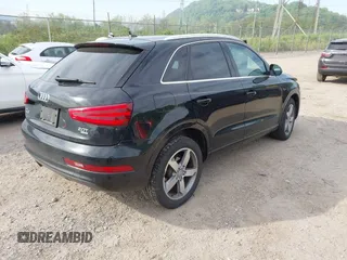 2015 Audi Q3 Prestige with VIN WA1GFCFS2FR009448, listed as a IAAI auction lot 42236056 with 147,644 mi miles and . Bid and sale history available at DreamBid. Image 4.