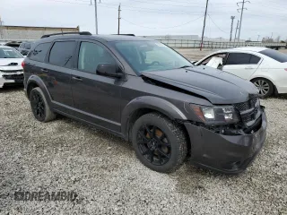 2019 Dodge Journey SE with VIN 3C4PDCBG5KT874901, listed as a Copart auction lot 50047635 with 112,768 mi miles and Salvage Title. Bid and sale history available at DreamBid. Image 4.