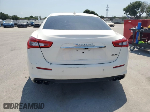 2019 Maserati Ghibli z VIN ZAM57XSA6K1319461, wystawiony jako Copart lot #57321665 z przebiegiem Nie podano mil oraz Tytuł czysty. Historia ofert i sprzedaży dostępna na DreamBid. Obrazek 6.