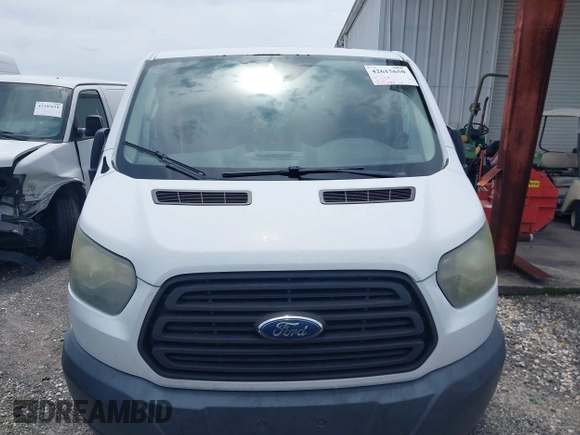 2016 Ford Transit Cargo z VIN 1FTYE1YM5GKB08601, wystawiony jako IAAI lot #42615650 z przebiegiem 275 441 mil mil oraz . Historia ofert i sprzedaży dostępna na DreamBid. Obrazek 12.