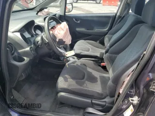 2009 Honda Fit Sport z VIN JHMGE88489S023368, wystawiony jako Copart lot #59741195 z przebiegiem 153 384 mil mil oraz Szkoda całkowita • Salvage title. Historia ofert i sprzedaży dostępna na DreamBid. Obrazek 7.