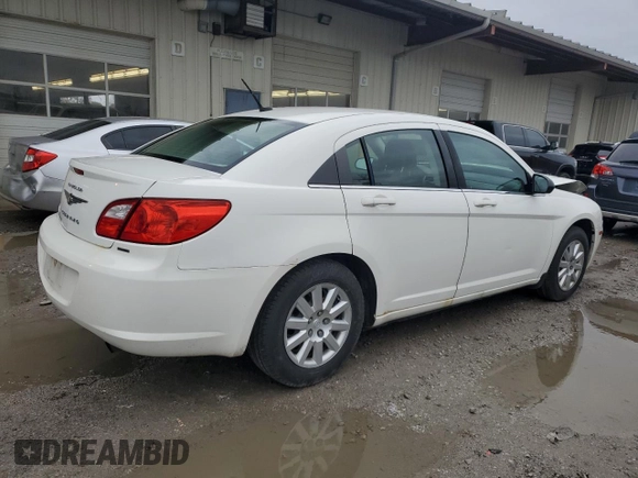 2010 Chrysler Sebring Touring with VIN 1C3CC4FB7AN112467, listed as a Copart auction lot 80875114 with 128,874 mi miles and Salvage Title. Bid and sale history available at carsss.com. Image 3.