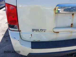 2011 Honda Pilot Touring with VIN 5FNYF4H98BB087713, listed as a IAAI auction lot 42132764 with 250,507 mi miles. Bid and sale history available at carsss.com. Image 19.