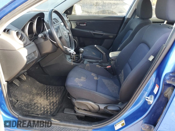 2006 Mazda 3 S Grand Touring with VIN JM1BK343861434940, listed as a Copart auction lot 63624024 with 56,737 mi miles and Salvage Title. Bid and sale history available at DreamBid. Image 7.