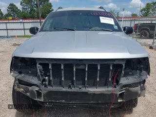 2002 Jeep Grand Cherokee Laredo with VIN 1J4GX48S32C288387, listed as a IAAI auction lot 42212249 with 151,028 mi miles and . Bid and sale history available at DreamBid. Image 13.