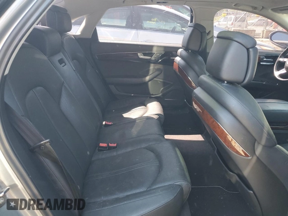 2012 Audi A8 z VIN WAURVAFDXCN001167, wystawiony jako Copart lot #57227105 z przebiegiem 154 409 mil mil oraz Szkoda całkowita • Salvage title. Historia ofert i sprzedaży dostępna na DreamBid. Obrazek 10.