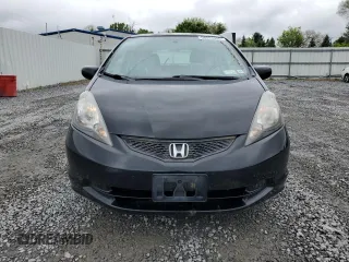2010 Honda Fit z VIN JHMGE8H22AS027239, wystawiony jako Copart lot #59358935 z przebiegiem 121 802 mil mil oraz Czysty tytuł • Clean title. Historia ofert i sprzedaży dostępna na DreamBid. Obrazek 5.