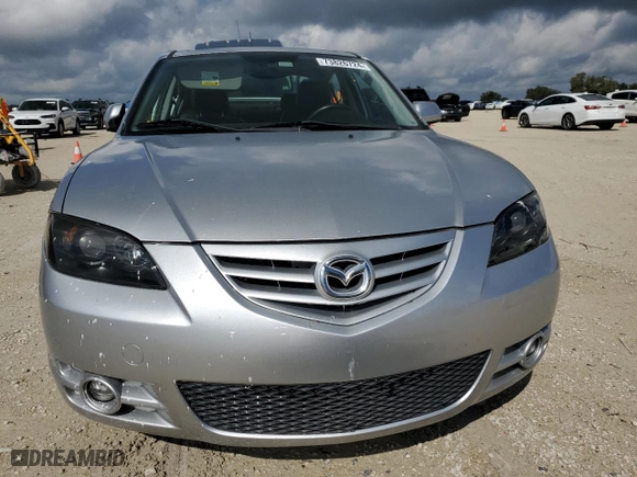 2005 Mazda Mazda3 s with VIN JM1BK323551220599, listed as a Copart auction lot 73826724 with 0 mi miles and Salvage Title. Bid and sale history available at carsss.com. Image 5.