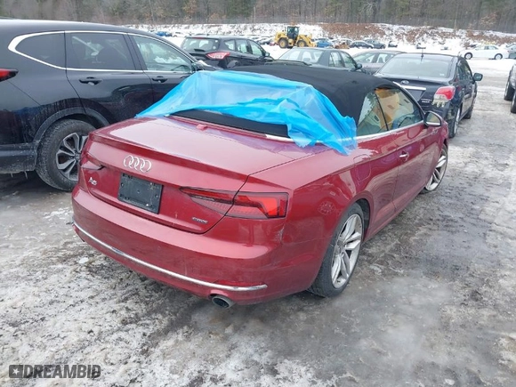 2019 Audi A5 Cabriolet Premium Plus with VIN WAUYNGF56KN002340, listed as a IAAI auction lot 41521638 with 69,381 mi miles. Bid and sale history available at carsss.com. Image 4.