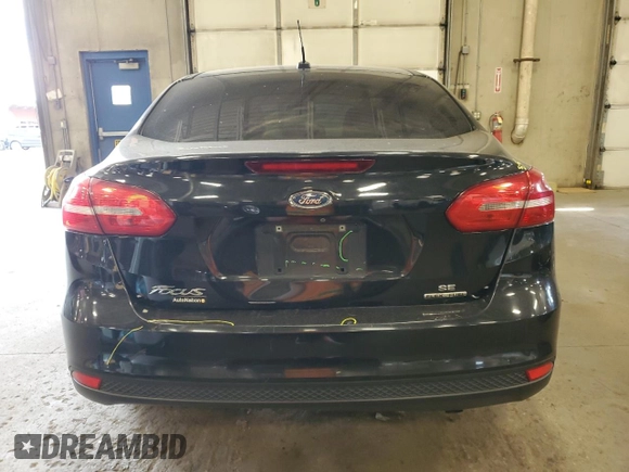 2015 Ford Focus SE z VIN 1FADP3F29FL255928, wystawiony jako Copart lot #72643654 z przebiegiem 189 984 mil mil oraz Szkoda całkowita • Salvage title. Historia ofert i sprzedaży dostępna na DreamBid. Obrazek 6.