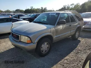 2000 GMC Jimmy SLS Base with VIN 1GKCS18W0YK167906, listed as a Copart auction lot 73840484 with 141,230 mi miles and Salvage Title. Bid and sale history available at carsss.com. Image 1.