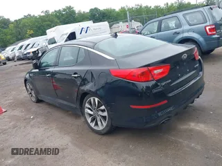 2014 Kia Optima SX Turbo with VIN 5XXGR4A61EG294366, listed as a IAAI auction lot 42540516 with 195,335 mi miles and . Bid and sale history available at DreamBid. Image 3.
