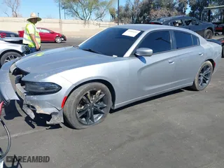2017 Dodge Charger SE with VIN 2C3CDXBG6HH576448, listed as a IAAI auction lot 41666413 with 173,559 mi miles. Bid and sale history available at carsss.com. Image 2.