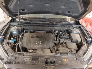 2016 Mazda CX-5 Touring with VIN JM3KE2CY7G0867355, listed as a IAAI auction lot 41963169 with 117,727 mi miles and . Bid and sale history available at DreamBid. Image 10.
