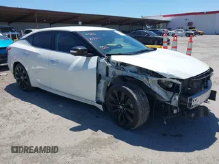 2018 Nissan Maxima Platinum z VIN 1N4AA6APXJC371818, wystawiony jako IAAI lot #42337697 z przebiegiem 115 523 mil mil oraz . Historia ofert i sprzedaży dostępna na DreamBid. Obrazek 1.