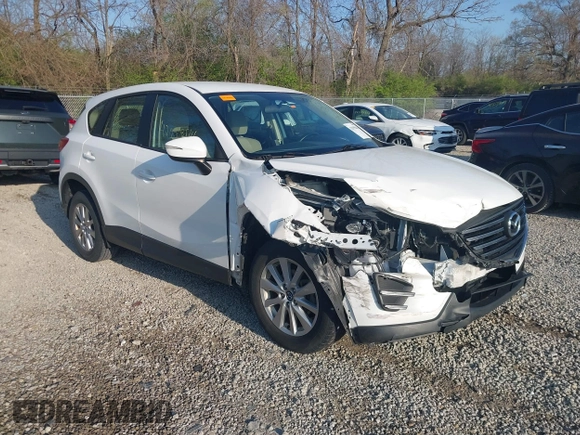 2016 Mazda CX-5 Sport with VIN JM3KE2BY2G0819604, listed as a IAAI auction lot 42059846 with 124,911 mi miles. Bid and sale history available at carsss.com. Image 1.