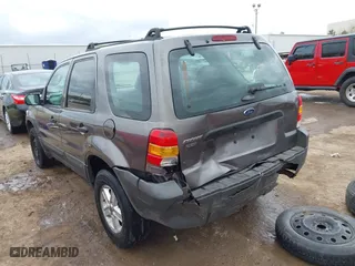 2006 Ford Escape XLS with VIN 1FMYU92ZX6KB10330, listed as a IAAI auction lot 41855529 with 249,548 mi miles. Bid and sale history available at carsss.com. Image 3.