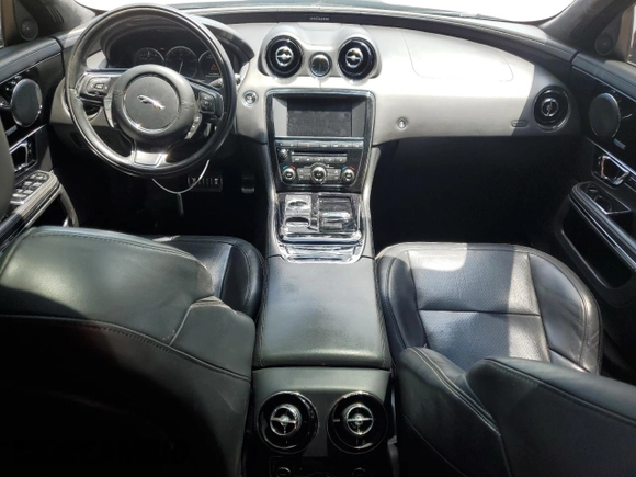 2015 Jaguar XJ с VIN SAJWJ1CD9F8V83885, выставлен на аукционе Copart как лот 58016335 с пробегом 81 794 миль миль и Чистый • Clean title. История ставок и продаж доступна на DreamBid. Изображение 8.