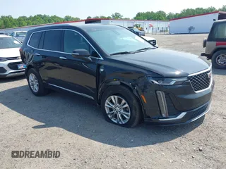 2023 Cadillac XT6 AWD Luxury with VIN 1GYKPBR49PZ169939, listed as a IAAI auction lot 42424555 with 55,461 mi miles and . Bid and sale history available at DreamBid. Image 1.