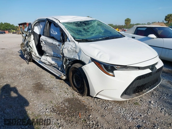 2020 Toyota Corolla LE with VIN 5YFEPRAEXLP092941, listed as a IAAI auction lot 41902363 with 62,847 mi miles. Bid and sale history available at carsss.com. Image 1.