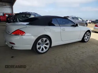 2006 BMW 6 Series 650Ci z VIN WBAEK134X6CN77921, wystawiony jako Copart lot #54093355 z przebiegiem 162 363 mil mil oraz Czysty tytuł • Clean title. Historia ofert i sprzedaży dostępna na DreamBid. Obrazek 3.
