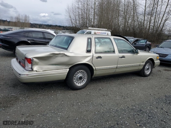1997 Lincoln Town Car Executive with VIN 1LNLM81W9VY643745, listed as a Copart auction lot 47921365 with 68,821 mi miles and Salvage Title. Bid and sale history available at carsss.com. Image 3.