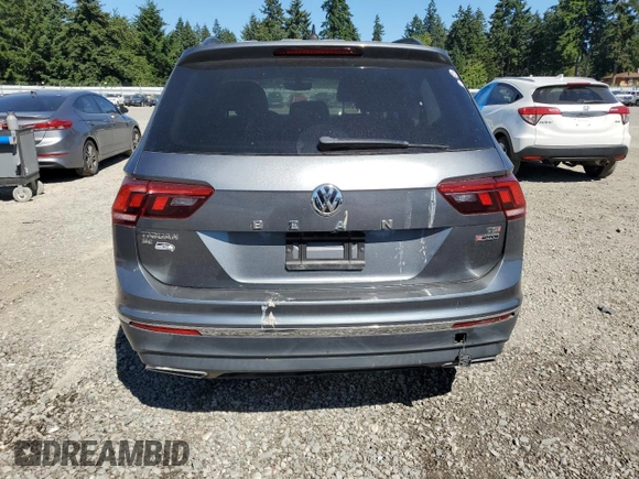 2018 Volkswagen Tiguan SEL с VIN 3VV2B7AX3JM221941, выставлен на аукционе Copart как лот 64656555 с пробегом Не указан миль и Списание • Salvage title. История ставок и продаж доступна на DreamBid. Изображение 6.