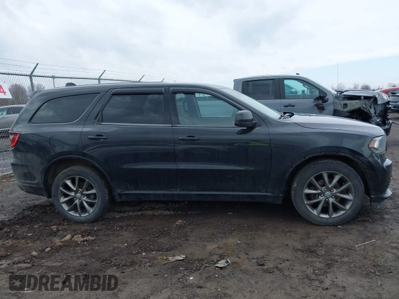 2015 Dodge Durango SXT with VIN 1C4RDJAG2FC101402, listed as a IAAI auction lot 41864200 with 191,667 mi miles and . Bid and sale history available at carsss.com. Image 13.