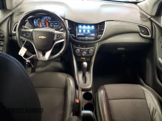 2021 Chevrolet Trax LT с VIN KL7CJLSM1MB375267, выставлен на аукционе Copart как лот 52188875 с пробегом 52 566 миль миль и Списание • Salvage title. История ставок и продаж доступна на DreamBid. Изображение 8.