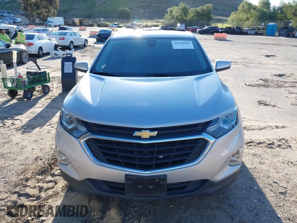 2020 Chevrolet Equinox LT with VIN 2GNAXUEV7L6111580, listed as a IAAI auction lot 41830060 with 96,968 mi miles and . Bid and sale history available at DreamBid. Image 12.
