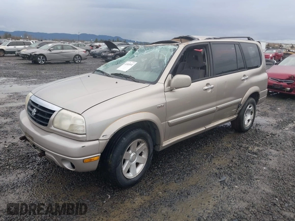 2001 Suzuki XL7 Standard z VIN JS3TX92VX14114699, wystawiony jako IAAI lot #41085552 z przebiegiem 195 316 mil mil oraz . Historia ofert i sprzedaży dostępna na DreamBid. Obrazek 2.