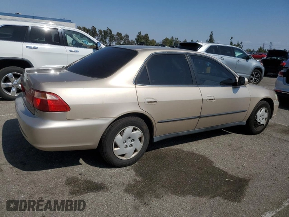 2000 Honda Accord LX z VIN 1HGCG1643YA089899, wystawiony jako Copart lot #54937555 z przebiegiem 196 596 mil mil oraz Szkoda całkowita • Salvage title. Historia ofert i sprzedaży dostępna na DreamBid. Obrazek 3.