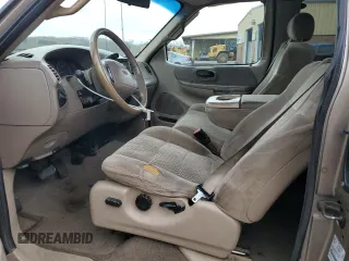 2002 Ford F-150 XL with VIN 1FTRX08L12KA41875, listed as a Copart auction lot 64756525 with 221,793 mi miles and Non repairable. Bid and sale history available at DreamBid. Image 7.