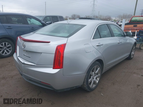 2014 Cadillac ATS Standard RWD z VIN 1G6AA5RA1E0177452, wystawiony jako IAAI lot #39138915 z przebiegiem 134 473 mil mil oraz . Historia ofert i sprzedaży dostępna na DreamBid. Obrazek 4.