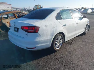 2017 Volkswagen Jetta 1.4T S with VIN 3VW2B7AJ7HM210670, listed as a IAAI auction lot 41725936 with 69,135 mi miles. Bid and sale history available at carsss.com. Image 4.