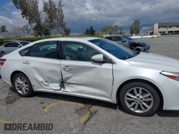 2014 Toyota Avalon Limited z VIN 4T1BK1EB1EU117097, wystawiony jako IAAI lot #41937996 z przebiegiem 169 336 mil mil oraz . Historia ofert i sprzedaży dostępna na DreamBid. Obrazek 6.