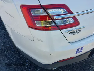 2013 Ford Taurus SEL with VIN 1FAHP2E80DG179961, listed as a IAAI auction lot 42088532 with 131,196 mi miles and . Bid and sale history available at carsss.com. Image 18.