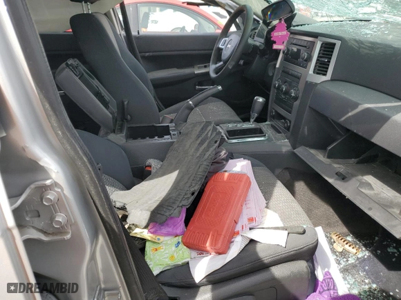 2010 Jeep Grand Cherokee Laredo with VIN 1J4PS4GK8AC156451, listed as a Copart auction lot 49108554 with 0 mi miles and Salvage Title. Bid and sale history available at carsss.com. Image 7.