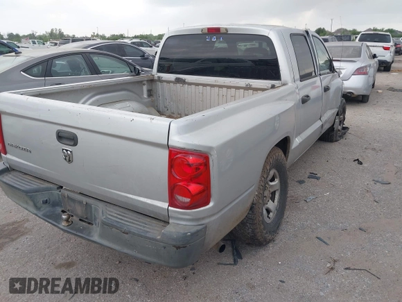 2005 Dodge Dakota ST z VIN 1D7HE28K75S308645, wystawiony jako IAAI lot #41931890 z przebiegiem 338 615 mil mil oraz . Historia ofert i sprzedaży dostępna na DreamBid. Obrazek 4.