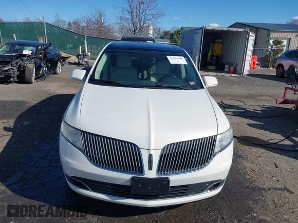 2013 Lincoln MKT EcoBoost with VIN 2LMHJ5AT8DBL55167, listed as a IAAI auction lot 41894396 with 121,114 mi miles. Bid and sale history available at carsss.com. Image 12.