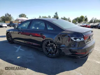 2024 Audi A8 with VIN WAULDAF86RN003891, listed as a Copart auction lot 77408804 with 4,812 mi miles and Salvage Title. Bid and sale history available at carsss.com. Image 2.