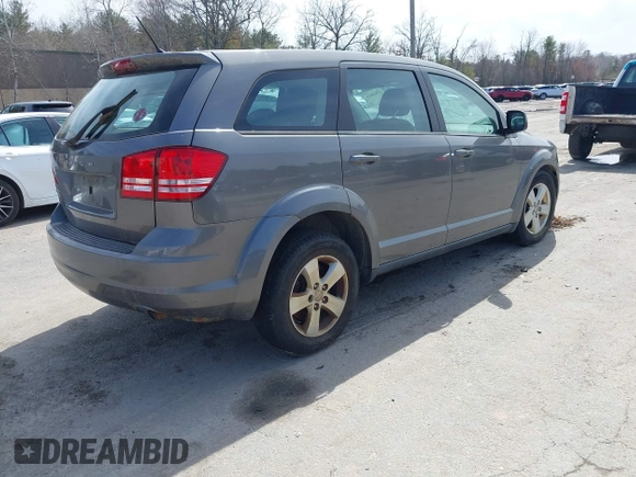 2013 Dodge Journey SE Plus with VIN 3C4PDCAB9DT582144, listed as a IAAI auction lot 41964828 with 171,398 mi miles and . Bid and sale history available at DreamBid. Image 4.