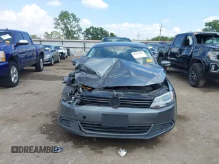 2014 Volkswagen Jetta Sedan SE with VIN 3VWD07AJ7EM238799, listed as a IAAI auction lot 40234990 with 113,297 mi miles. Bid and sale history available at carsss.com. Image 12.