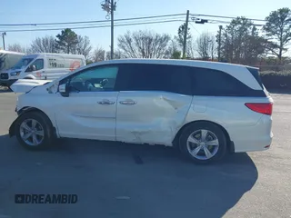 2018 Honda Odyssey EX-L z VIN 5FNRL6H79JB014419, wystawiony jako IAAI lot #41654269 z przebiegiem 84 372 mil mil oraz . Historia ofert i sprzedaży dostępna na DreamBid. Obrazek 14.