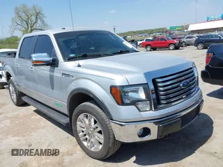 2013 Ford F-150 XL with VIN 1FTFW1EF2DKE60685, listed as a IAAI auction lot 42041238 with 114,936 mi miles and . Bid and sale history available at DreamBid. Image 1.