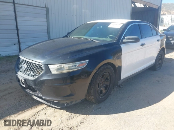 2014 Ford Police Interceptor with VIN 1FAHP2MK4EG124301, listed as a IAAI auction lot 41596193 with 101,314 mi miles and . Bid and sale history available at DreamBid. Image 2.
