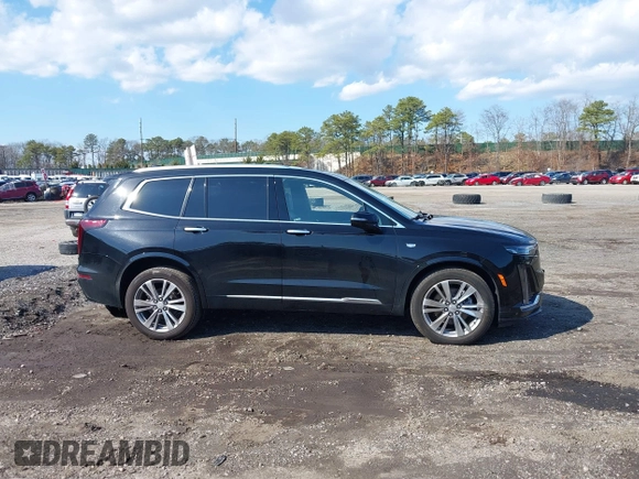 2023 Cadillac XT6 AWD Premium Luxury with VIN 1GYKPDRS8PZ153838, listed as a IAAI auction lot 41838527 with 60,034 mi miles and . Bid and sale history available at DreamBid. Image 13.