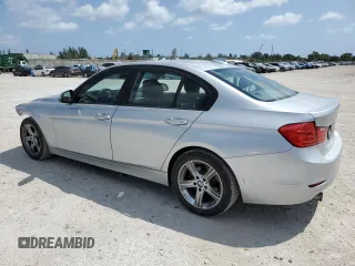 2015 BMW 3 Series 320i with VIN WBA3B1G51FNT64659, listed as a Copart auction lot 51007935 with 99,495 mi miles and Salvage Title. Bid and sale history available at carsss.com. Image 2.