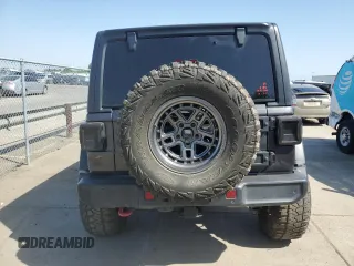 2020 Jeep Wrangler Unlimited Rubicon z VIN 1C4HJXFG4LW194482, wystawiony jako Copart lot #54494825 z przebiegiem 50 358 mil mil oraz Szkoda całkowita • Salvage title. Historia ofert i sprzedaży dostępna na DreamBid. Obrazek 6.